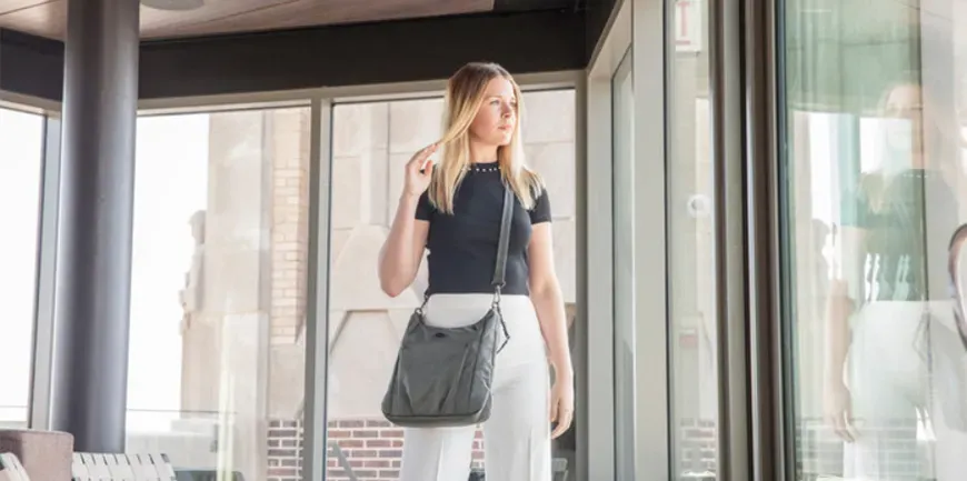 woman with travelon parkview hobo crossbody bag